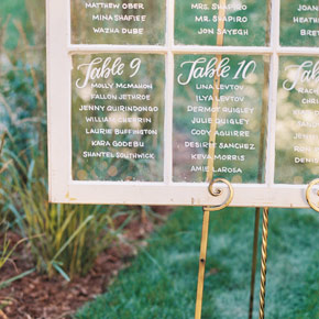 Seating chart on a vintage window | Taryn Eklund Ink | Ashley Sawtelle Photography