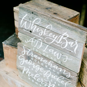 hand painted whiskey bar menu on reclaimed wood | Taryn Eklund Ink | photo by Connie Whitlock Photography